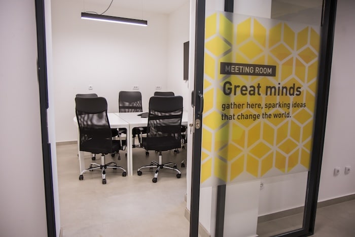 Larger meeting room set up for workshops and group sessions